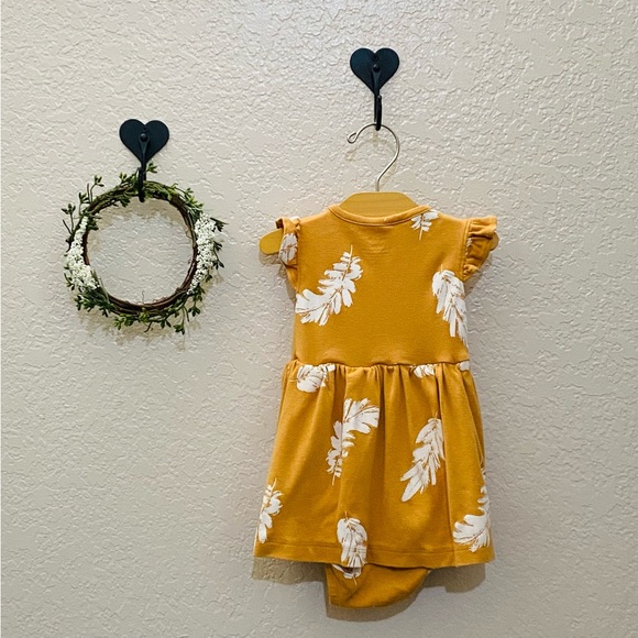 This is a mustard yellow dress and a cream colored cardigan - Picture 5 of 8